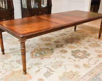 10. Classical Flame Veneered Dining Table