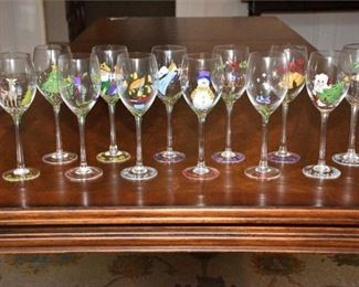 106. Twelve 12 Enamel Painted Chrismas Themed Wine Glasses