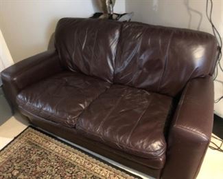 Leather love seat