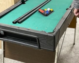 Mini pool table.
