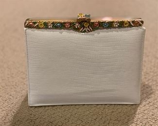 Vintage croc evening purse with jeweled flower adornments. Photo 1 of 2.