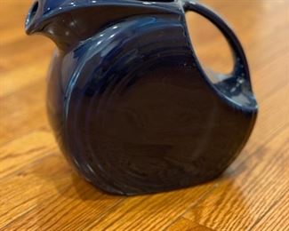 Fiesta Ware blue chip-free dinnerware set. Set includes 10 dinner plates, 8 soup bowls, 8 salad plates, 8 mugs, tea pot, pitcher, 3 serving bowls and 1 platter. Photo 2 of 4.