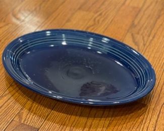 Fiesta Ware blue chip-free dinnerware set. Set includes 10 dinner plates, 8 soup bowls, 8 salad plates, 8 mugs, tea pot, pitcher, 3 serving bowls and 1 platter. Photo 1 of 4.