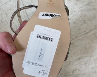 Brand new silver strappy Caparros heels. Size 9. Photo 2 of 2.