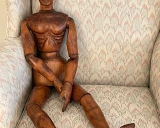 Carved wood man.