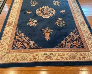 Area rug. Measures 5' x 7'.