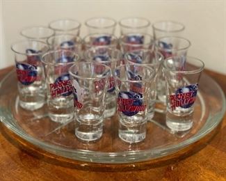 A dozen plus Planet Hollywood shot glasses.