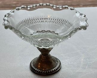 Fluted compote with weighted sterling silver base. Photo 1 of 2.