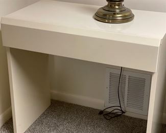 Vintage mid-century console/mini desk by Lane Furniture. The piece is finished in a rich, creamy pearl lacquer over heavyweight, solid wood - 2 available. Photo 1 of 2.