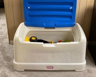 Little Tykes toy chest filled with vintage toys. Photo 1 of 2.