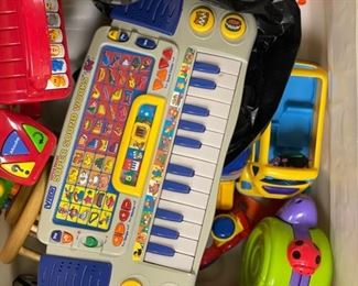 Little Tykes toy chest filled with vintage toys. Photo 2 of 2.