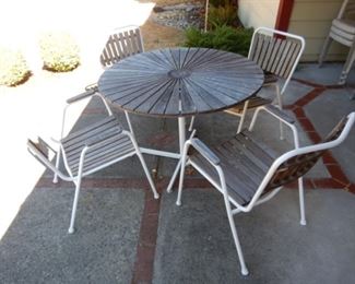 Amazing Teak Star Burst table patio set.
