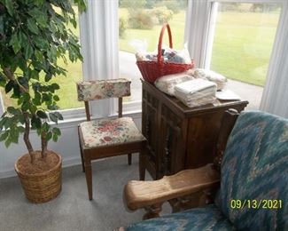 sewing machine in cabinet, patterns, supplies