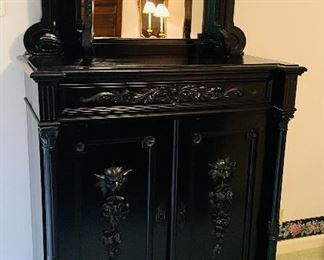 19th century Continental carved Ebony cabinet                      $ 795 now $600  • 81high 43wide 22deep