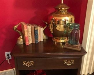 Ethan Allen Side Table with die cast cars, Brass Pot Lamp and more Antq./Vintage Books.  Crane Brass Book ends.