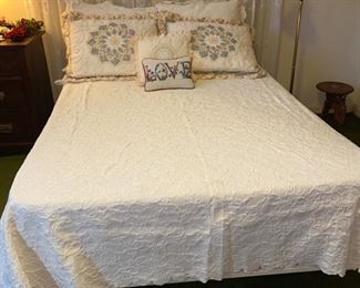 This is a genuine antique cast iron bed. It has the original rails too. 