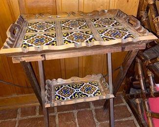 This little table actually folds up and the top is a removable tray so you can serve your honey breakfast in bed.