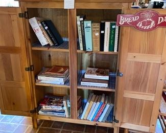 This cute little country cupboard will hold tons of your kitchen goodies. We are using it for cookbooks.