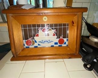 Bread boxes are not just for bread y’all. What about a hidden charging station?