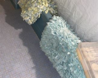 I have seen rag rugs before but not as pretty as these.