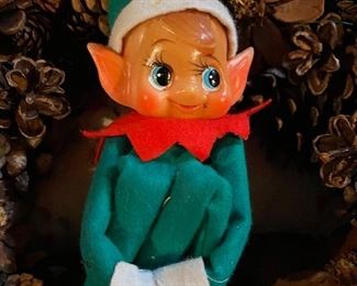 Knee hugging elf
