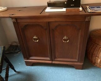 Sewing machine cabinet in excellent condition with Viking sewing machine