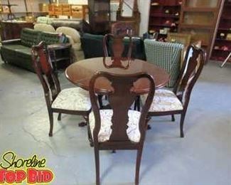 Cherrywood dining room table, four chairs and two leaves. Good condition, smoke and pet free home