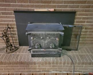 Very heavy.  This item will probably have to removed after the safe.  Bring ample help or equipment to remove properly without damaging the fireplace.