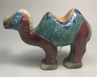 https://www.ebay.com/itm/114918154997	ME7007 South African Raku Pottery Camel Figurine (white, red, and blue head	BIN
