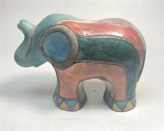 "https://www.ebay.com/itm/114918154995	"	ME7009 South African Raku Pottery Elephant Figurine (light green head)	BIN

