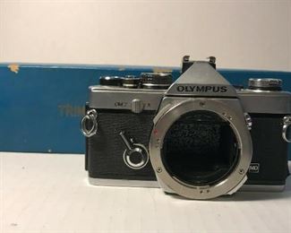 https://www.ebay.com/itm/115047930776	NC305 VINTAGE OLYMPUS OM-2 CAMERA (UNTESTED) W TRIMLITE ELEVATOR TRIPOD 		 Auction 
