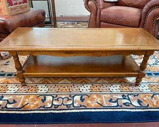 Vintage hard rock maple coffee table and a beautiful rug