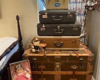 Wonderful vintage trunk with wood and leather bands plus two trays inside. This is the first one I have seen with more than one tray and it is in great condition. Vintage suit and vanity cases. Vintage Madam Alexander doll "Pussy Cat"
