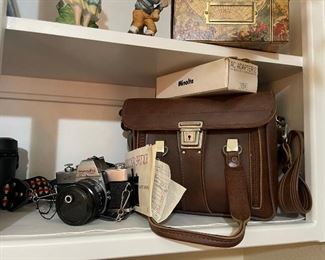 Minolta camera, lenses, leather bag