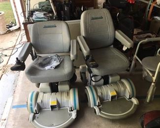 The Hoveround on the right is working and has all the paperwork and the charger. The one on the left has all the stuff also but won't take a charge.