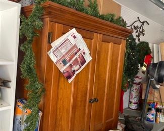 A nice entertainment Center. Also, if you need garland we've got it!