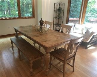 Winners Only Inc. "Devonshire" Dining Table. Measures 40" wide x 60" long with no leaf. Butterfly leaf is open in photo adding another 18" - so 78" in total. Bench is 14.5" wide x 60" long x 18.5" tall. 4 matching dining chairs. Floor to seat is 18". Floor to top of back is 38" tall. Very gently used. Asking $600.