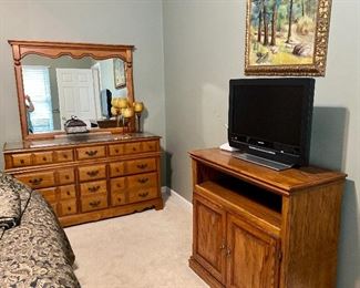 Vintage solid maple bedroom group, each piece priced separately—king size bed, chest of drawers, night stand and dresser with mirror. 