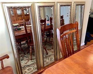 4 tall slender mirrors with beveled edges by Three Hands.