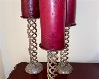 Brass candlestick trio.