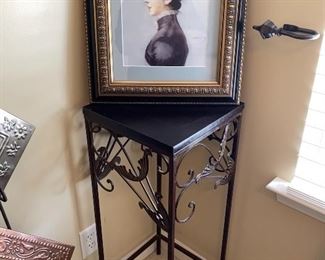 Metal plant stand and framed print.