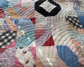 Several quilts—both vintage and newer, most hand stitched, varying condition.