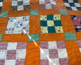 Several quilts—both vintage and newer, most hand stitched, varying condition.
