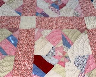Several quilts—both vintage and newer, most hand stitched, varying condition.