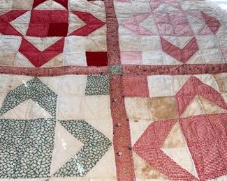 Several quilts—both vintage and newer, most hand stitched, varying condition.