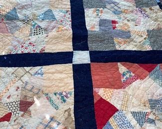 Several quilts—both vintage and newer, most hand stitched, varying condition.