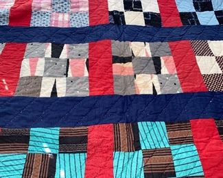 Several quilts—both vintage and newer, most hand stitched, varying condition.