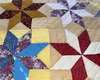 Several quilts—both vintage and newer, most hand stitched, varying condition.
