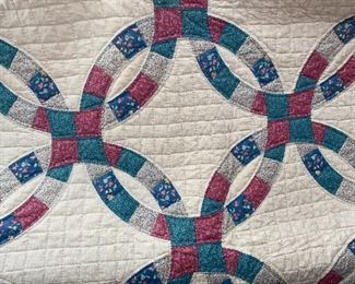 Several quilts—both vintage and newer, most hand stitched, varying condition.
