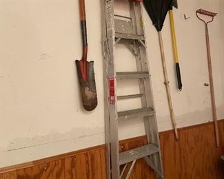 . . . an aluminum step ladder and yard tools